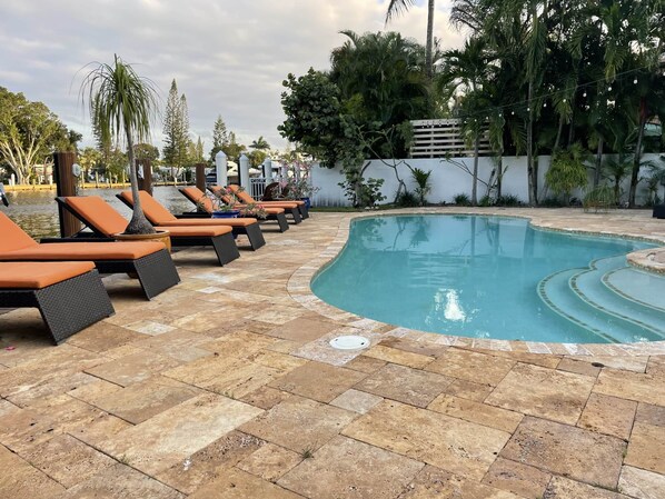 Pool, Dock, and Water view