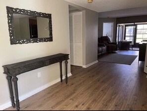 Main space with laminate hardwood flooring