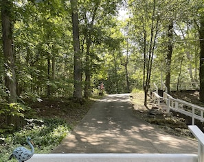 Steep driveway to lower parking area Accessible to all wheel & 4WD vehicles only