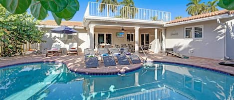 Enjoy the warm Florida weather outdoors next to the pool