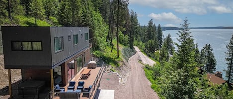 Perched on a hillside above Whitefish Lake, Tree Haus 3 offers incredible lake & mountain views.