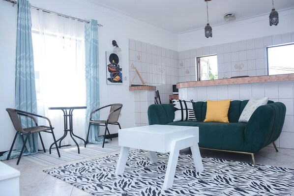 Living Room with open plan kitchen and dining area