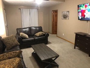 Spacious living room with a pullout queen bed