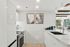 Full Kitchen with Oven, Cooktop, Refrigerator, Dishwasher, Coffe
