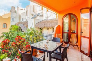 Great terrace overlooking the pool. Have a morning coffee here!