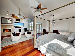 Primary Bedroom - King Bed, Fireplace, TV, Desk + Balcony Access - Second