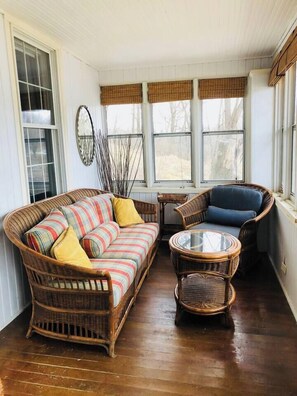 The perfect porch for sipping morning coffee!