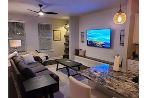 Living Room with 65" smart TV- open concept area
