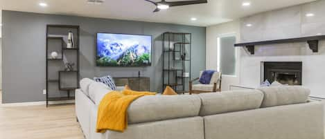 Large open living room with TV and streaming channels