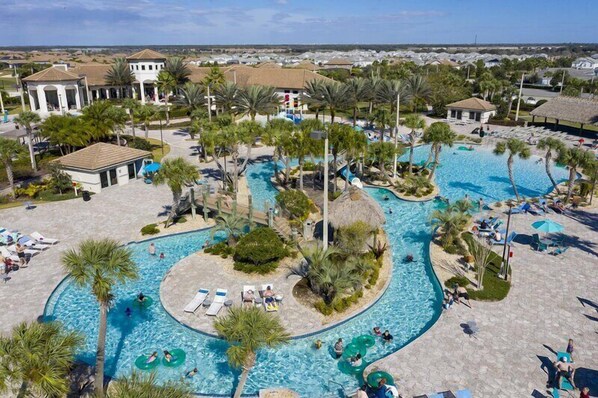 Indulge in the resort’s stunning pool with a lazy river, surrounded by tropical landscaping.