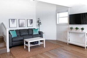 Enjoy the cozy living room with Roku TV (Hulu, Disney+, and ESPN+ included)