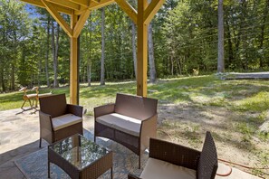 Seating By the Hot Tub and Expansive Yard