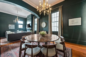 Gather for dinner at this beautiful one of a kind antique table.