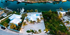 Directly on a deep water canal with large dock and private pool