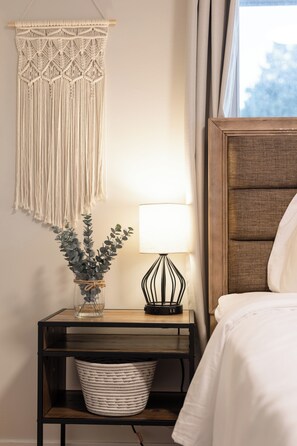 Upstairs Queen Bedroom with plugs on all the nightstand lamps to charge all your devices.