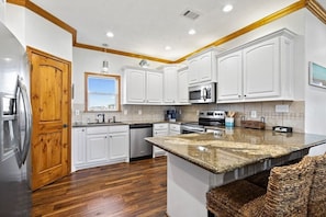 Modern stainless-steel appliances and plenty of counter space to enjoy.