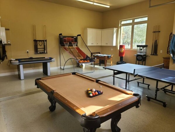 Game room with games and popcorn machine