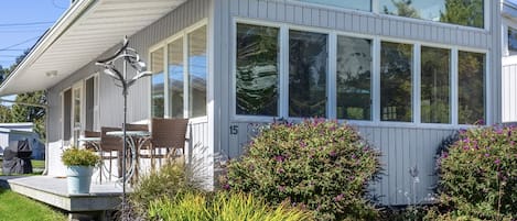 Waterfront cottage with beach access from large deck right on the sand!