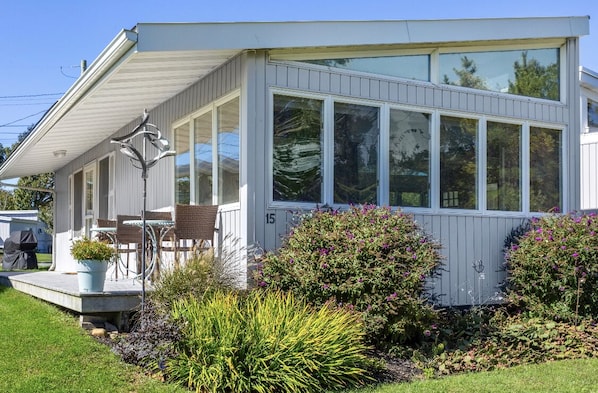 Waterfront cottage with beach access from large deck right on the sand!