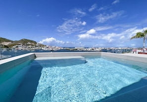 Luxury penthouse in the West Indies with pool terrace overlooking Simpson Bay