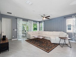 Beautiful Living Room with Comfy Sofa and Flat Screen TV