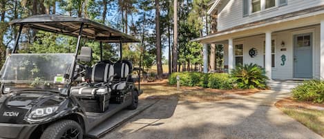 Front of House with 6-Seat Golf Cart