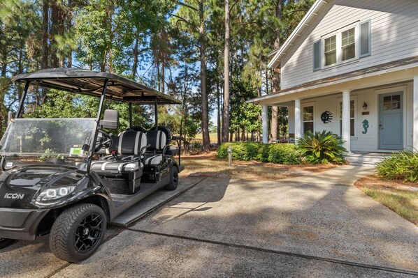 Front of House with 6-Seat Golf Cart