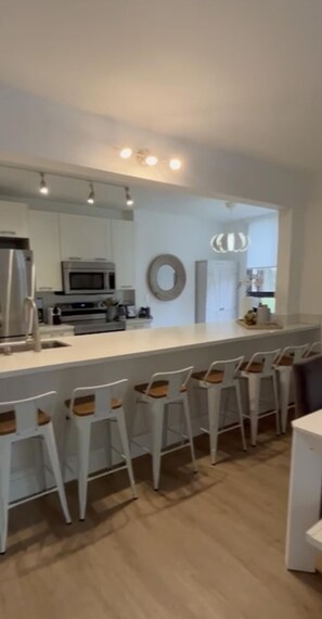 Kitchen area with wine cooler