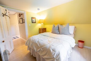Full size bed in this bedroom which faces the front of the house w/SMART TV
