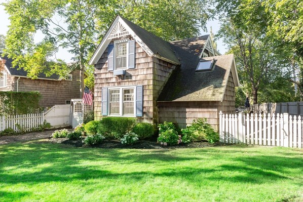Plenty of Natural light, fresh coat of paint, elegant landscaping