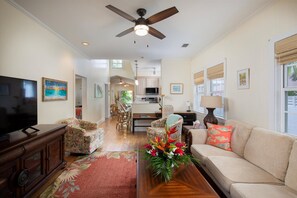 Key West charm with open living room with sleeper couch