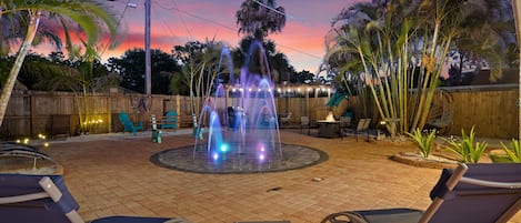 Make memories unlike anywhere else with our lighted splash pad. Beware: Family and friends will demand an invite next time if you post this on social media!