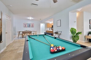 Pool anyone? Note how open this space is - living, dining, and kitchen areas all seamlessly connected, with the 3rd bath just around the corner for convenience.