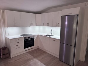 Kitchen from December 2024 with quality equipment.