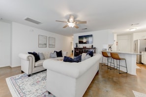 Large living room area with plenty of seating and relaxation 

