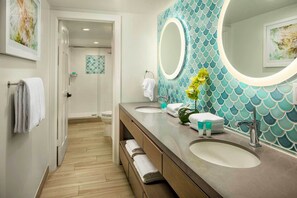 Primary bathroom comes with a dual vanity.
