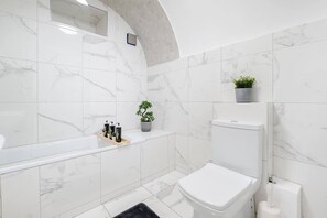 Full modern designed luxury bathroom with all soaps and towels provided. Its even quipped with. a built-in toilet bidet (perfectly convenient for Arabic and asian guests)