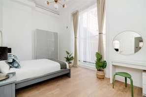 Indulge in luxury: ensuite bedroom, king-size bed, private bath, air-conditioned