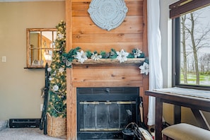 Wood fireplace. Firewood shed is located just outside the front door of condo.