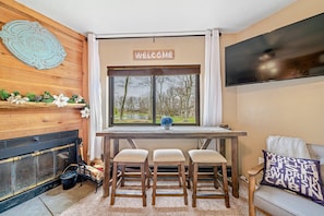 Table with view of the pond, perfect for morning coffee or remote work with wifi