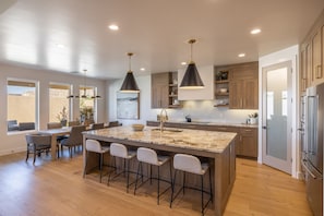 Kitchen Island - The Kitchen Island comfortably seats 4 adults and creates a great space for serving and preparing meals.