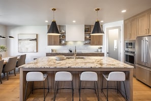 Modern Kitchen - This sleek, modern kitchen has all the best upgrades to make cooking a breeze!