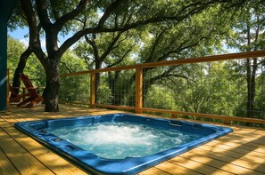 Hot tub built into the deck.