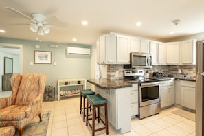 Kitchen area with stools.
