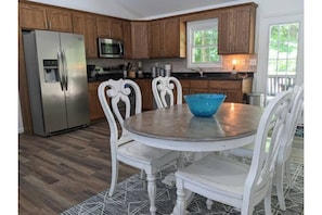 Eat-In kitchen with access to back porch