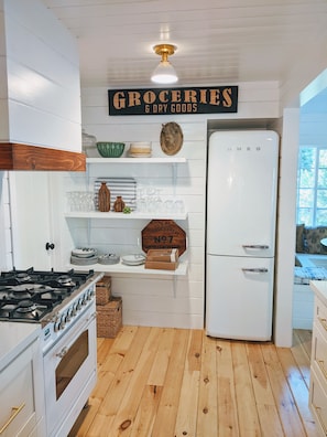 Our adorable farmhouse kitchen is fully equipped with high end appliances.