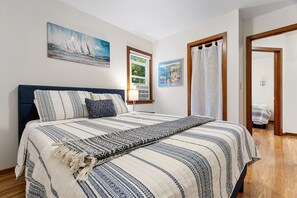 Queen Bed with dresser in closet 