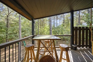 Upstairs deck high top for lunch or games or drinks with a view