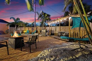 From our sanded beach area, to the gas firepit and tiki hut, this magical courtyard offers a variety of comfortable seating and special amenities.