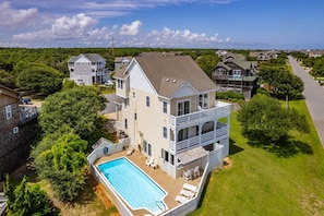 Hendrix Hideaway | Aerial view rear of house and pool area